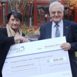 Cathy Yelf receives grant cheque from Cllr Jim Neal