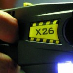 Taser image courtesy of <a href="http://upload.wikimedia.org/wikipedia/commons/f/fb/Taser-x26.jpg" target="_blank">Wikipedia</a>