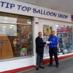 Dave Stanbridge receives his cheque from Cllr John Cockaday