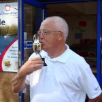 Winner John Wass proudly kissing his prize