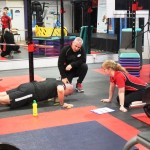 The late Heath Macdonald supporting a member of the gym in April of this year. 