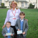Julie Page (Lucy's mum) and two pupils from the school